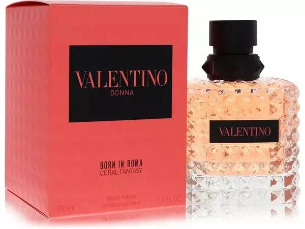 Valentino Donna Born In Roma Coral Fantasy perfume bottle with coral sunset background and floral notes illustration
