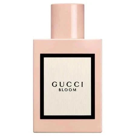 Gucci Bloom Eau De Parfum bottle with floral design representing silky smooth feminine fragrance with jasmine, tuberose, and iris notes