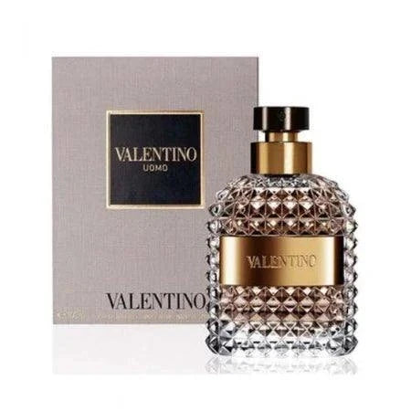 Valentino Uomo Cologne bottle with woody fragrance ingredients like bergamot, coffee, leather, and cedar