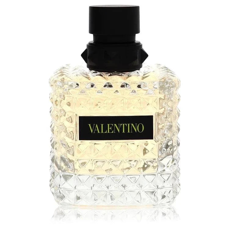 Valentino Donna Born In Roma perfume bottle with yellow floral and citrus design showcasing bergamot, lemon, rose, peony, vanilla, cedarwood, and musk notes
