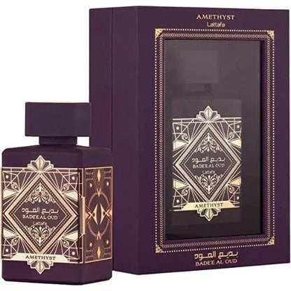 Lattafa Badee Al Oud Amethyst perfume bottle with floral and amber notes packaging