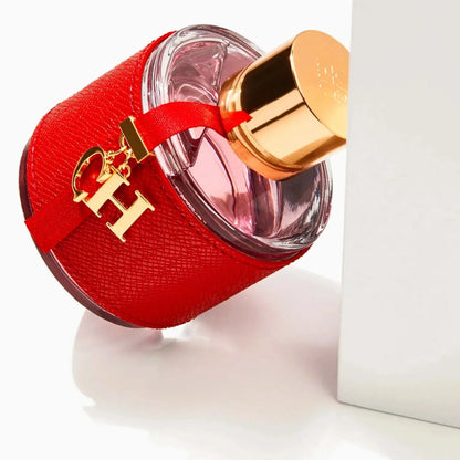 Carolina Herrera CH women's fragrance bottle with citrus, floral, and warm leathery notes