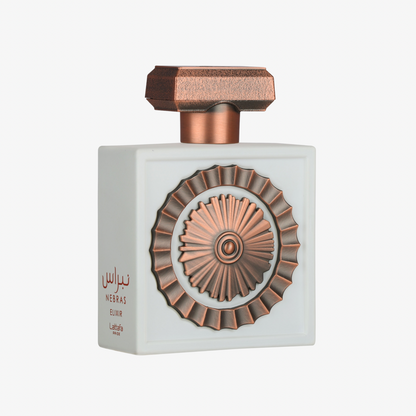 Lattafa Nebras Elixir perfume bottle in pale ivory with rose-gold geometric cap and ornate embossed circular medallion.