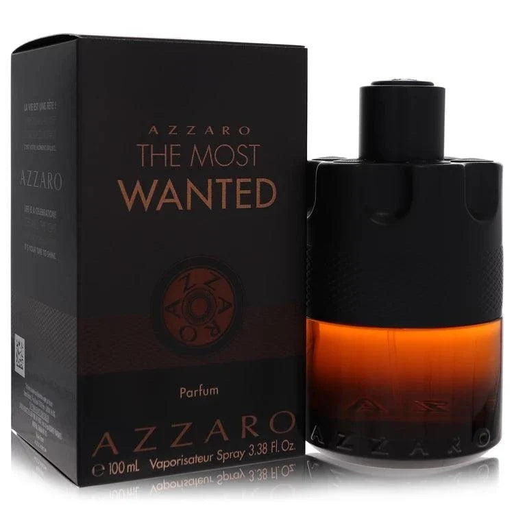 Azzaro The Most Wanted Parfum in a black textured bottle with a vivid amber gradient and matching black box.