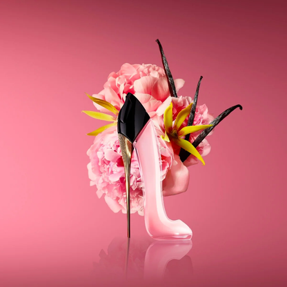 Carolina Herrera Good Girl Blush perfume bottle in a blush-pink stiletto design with floral arrangement and black heel accents