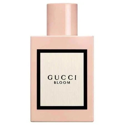 Gucci Bloom Eau De Parfum bottle with floral design representing silky smooth feminine fragrance with jasmine, tuberose, and iris notes
