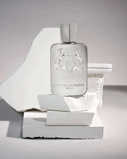 Parfum De Marly silver metallic rectangular perfume bottle with embossed horses and shield design on front