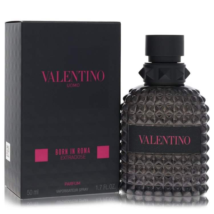 Valentino Uomo Born in Roma parfum in a dark smoky glass bottle with a black studded texture and matching box.